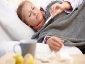 Donna a letto con la febbre