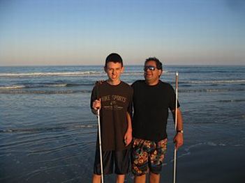 Persone con disabilità visiva in vacanza al mare