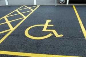 Parcheggio riservato a persone con disabilità