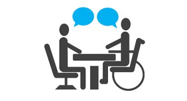 Reazlizzazione grafica con una persona in carrozzina al tavolo di fronte a una persona non disabile